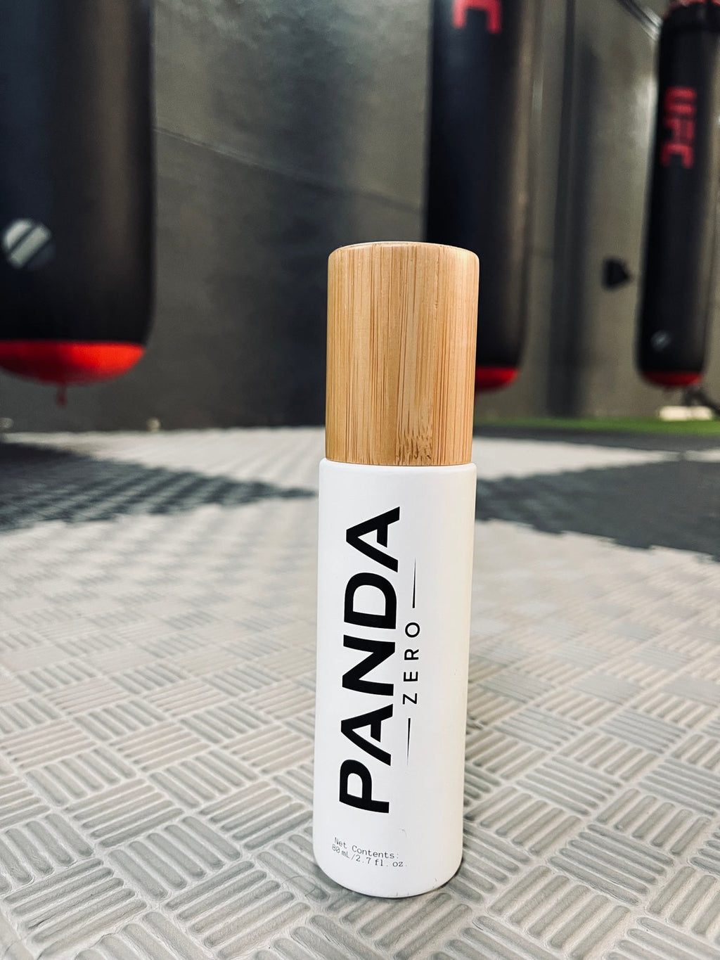 Panda Zero white bottle with bamboo cap at the gym